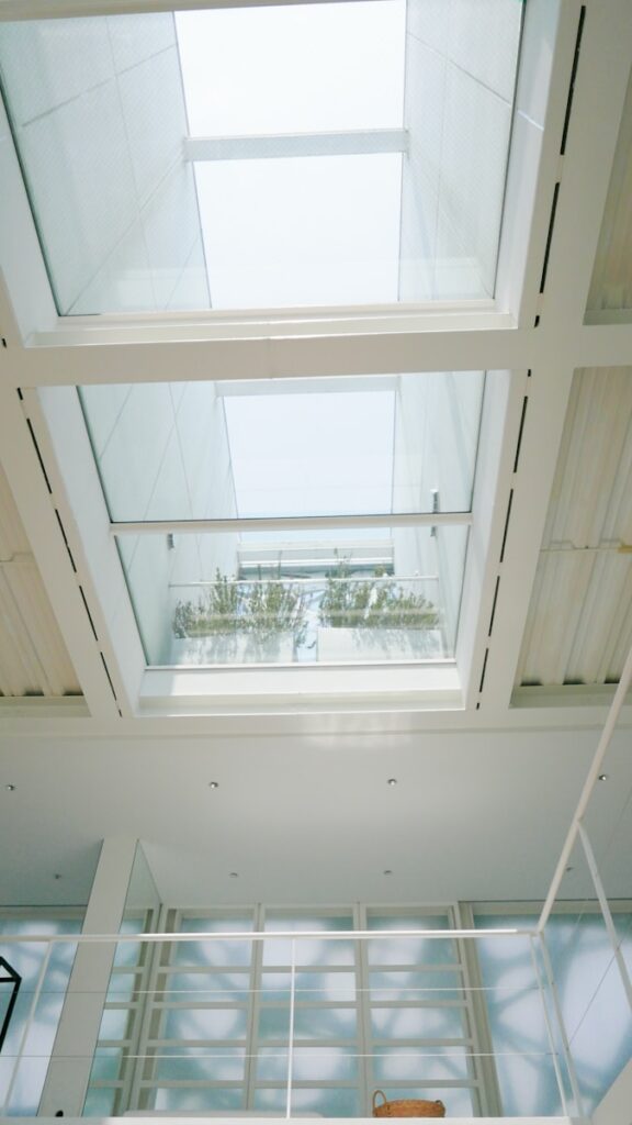 white wooden framed glass window