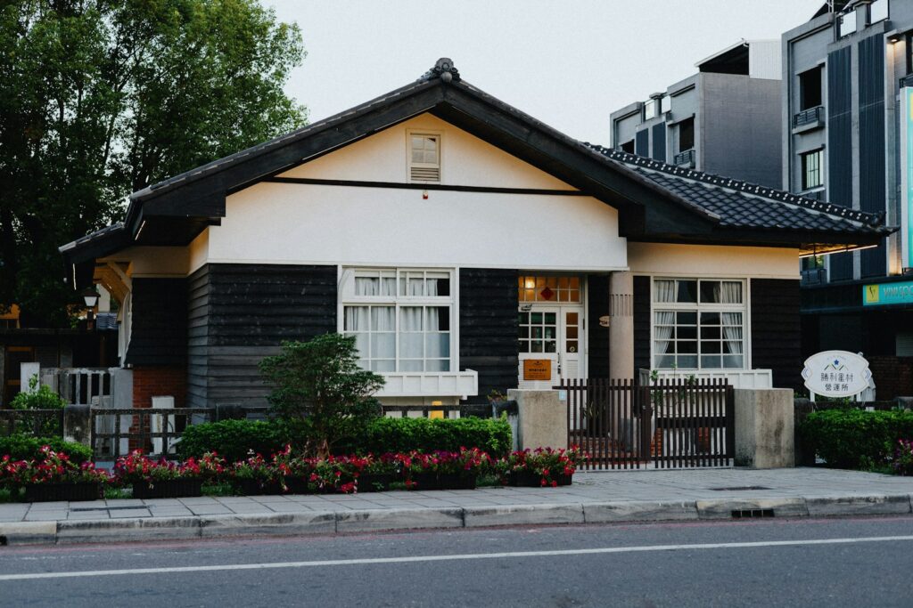 Traditional asian-style house with black and white accents.